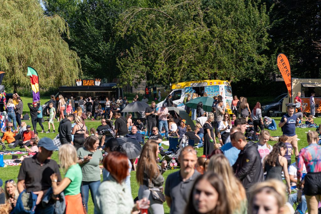 Crowd shot from LancsFest24 looking out towards the river from the main stage